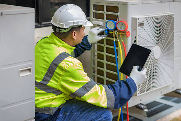Professional Heat Pump Repair technician working in Cutchogue, NY